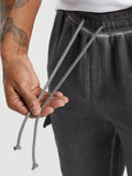 Gymshark Heavyweight Washed Cargo Joggers — Black/Solid Flat Oil Dye — 7