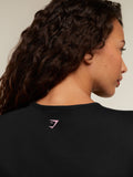 Gymshark For The Ones Who Show Up Graphic Baby Tee — Black — 6