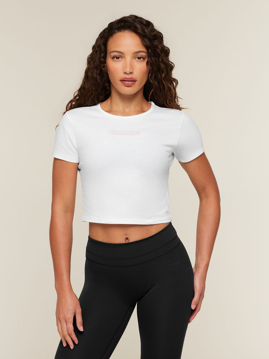 Gymshark For The Ones Who Show Up Graphic Baby Tee — White — 1