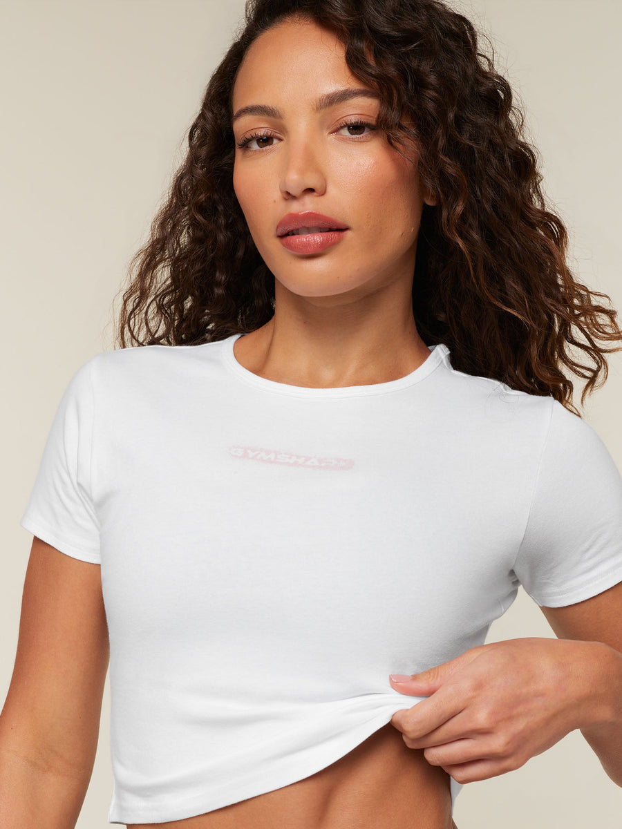 Gymshark For The Ones Who Show Up Graphic Baby Tee — White — 5