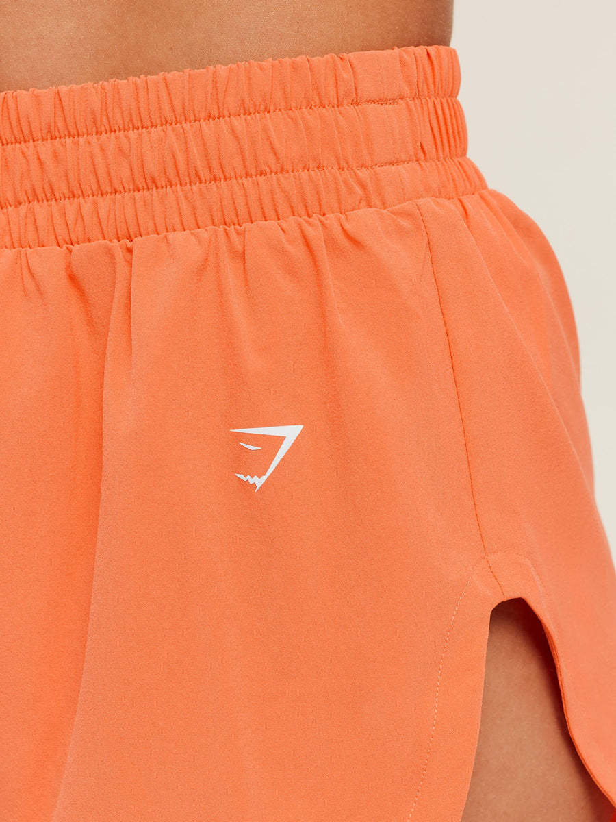 Gymshark Relay High Leg Shorts — Dayglow Peach — 6