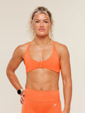 Gymshark Relay Seamless Light Support Sports Bra — Dayglow Peach — 1