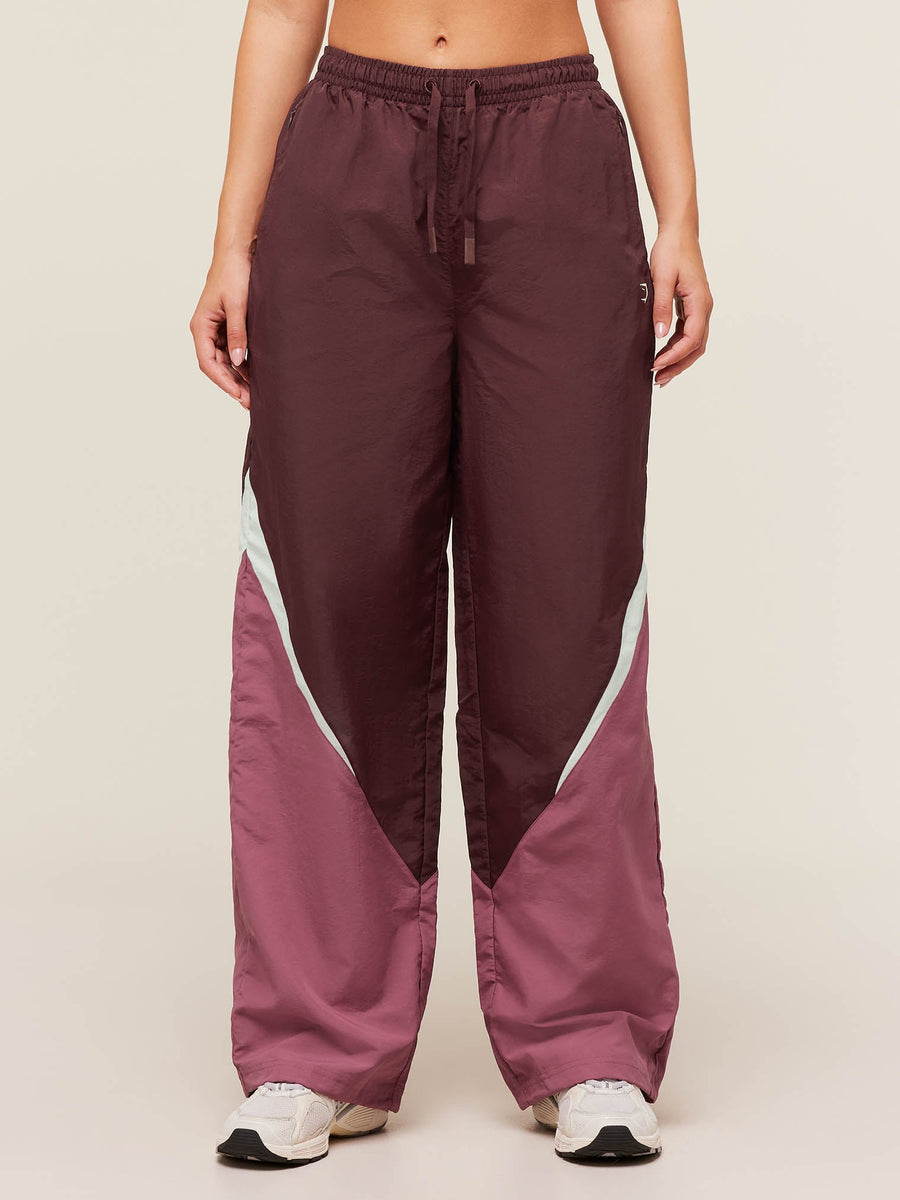 Gymshark Contrast Track Pants — Rich Maroon/Reset Pink/Oat White — 1